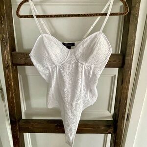 new white lace bodysuit, size L